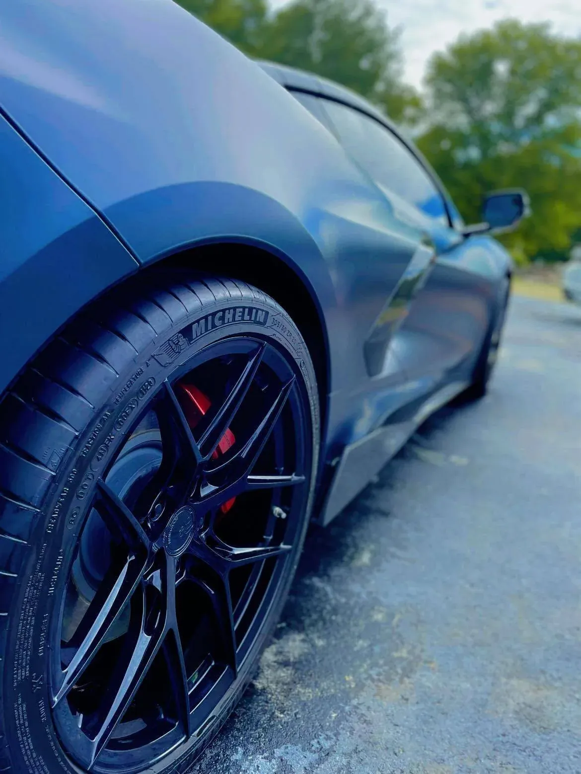 Corvette rear wheel and tire, clean and dressed after detailing