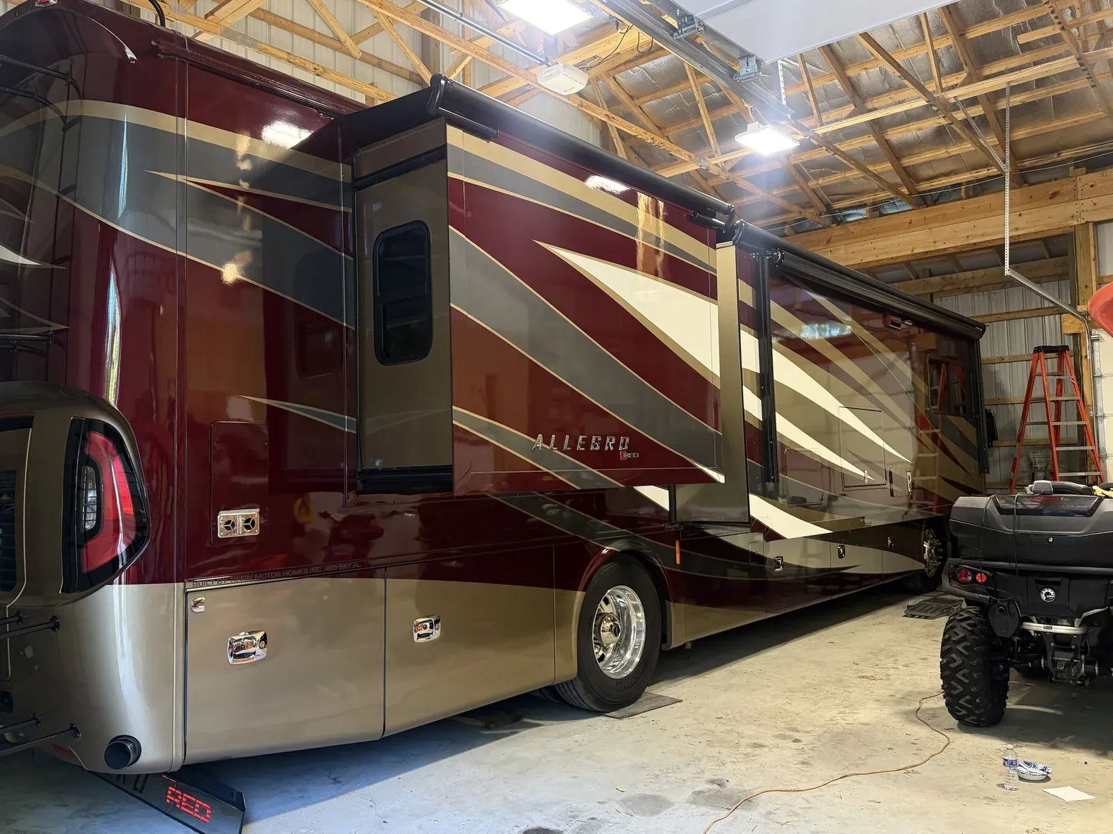 Tiffin Allegro Red Class A motorhome fully detailed inside a storage barn