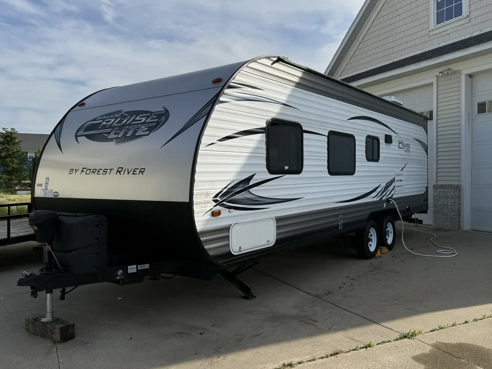 Forest River Salem Cruise Lite travel trailer washed in the driveway